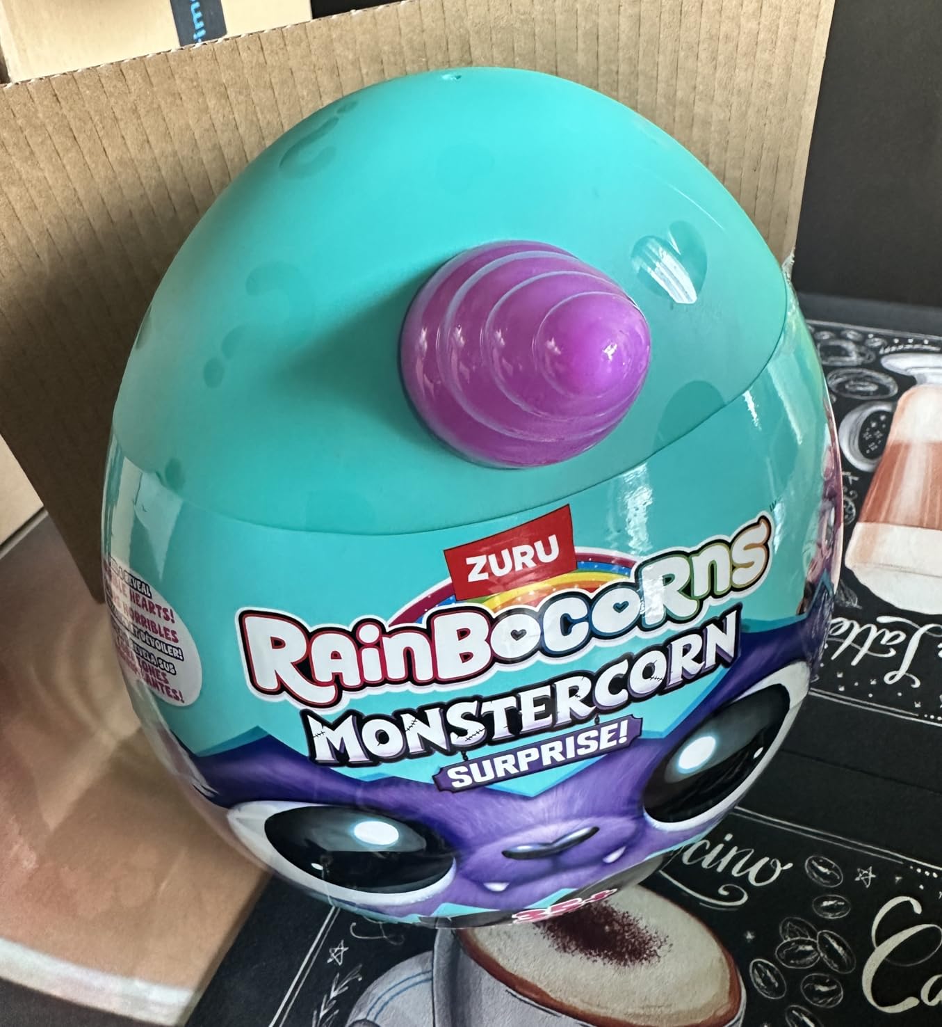 Rainbocorns Monstercorn Surprise peluche Raven corvo