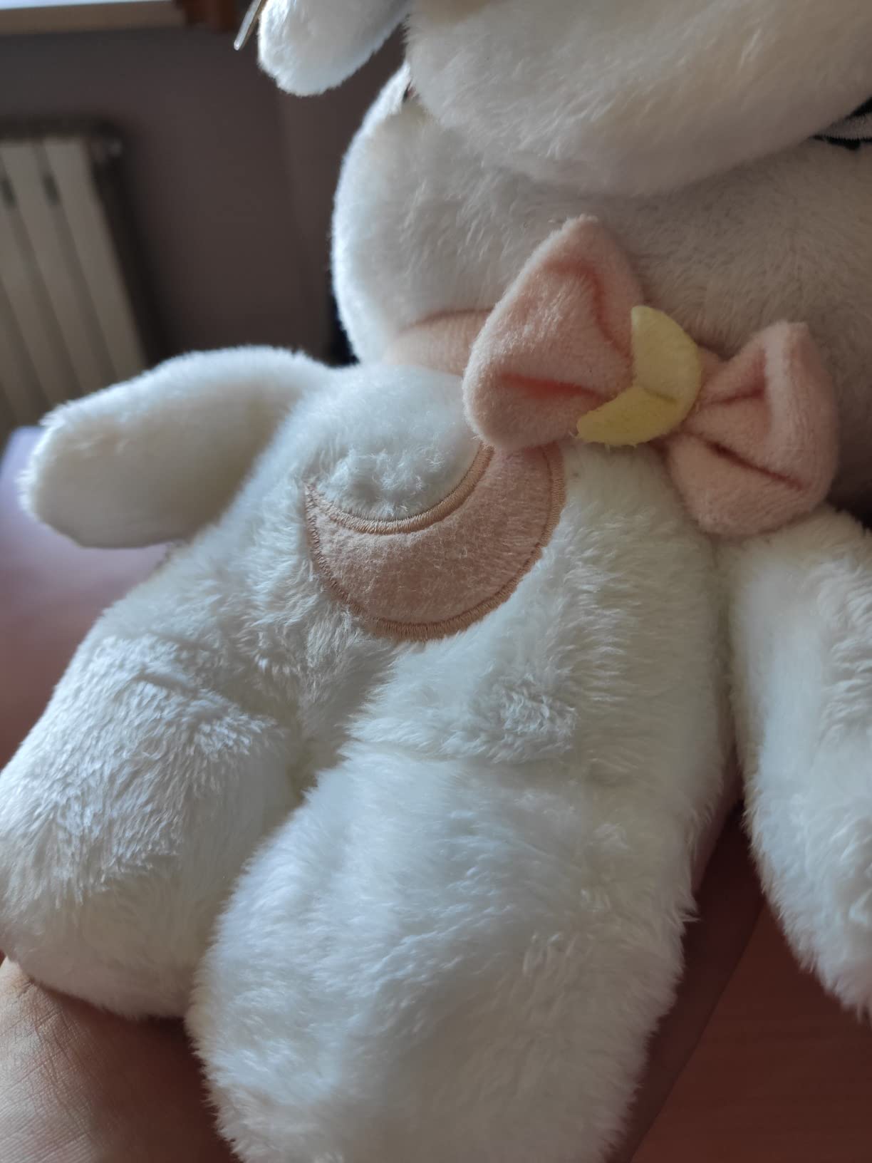 Imc Toys Peekapets Coniglietto Bianco peluche orecchie mobili