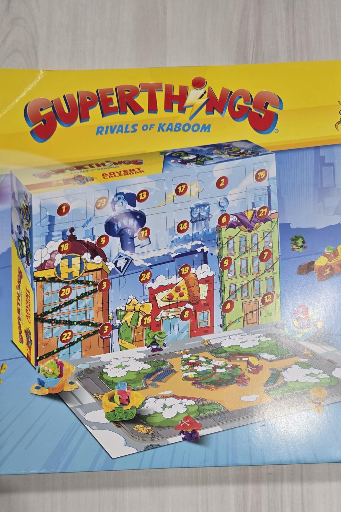 SUPERTHINGS Calendario dell’Avvento Natalizio 24 Sorprese Mini Figure